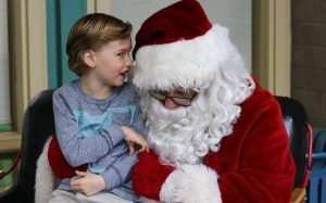 kid with santa photo